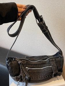 Vintage washed black denim hobo bag with multi-zipper pockets and fashion print