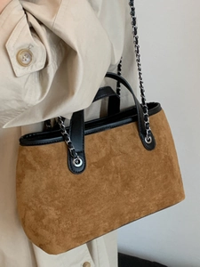 Brown faux suede tote bag with black leather trim and silver metal chain strap for women