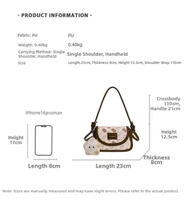 Size chart showing dimensions for the vintage PU shoulder bag with an iPhone for scale