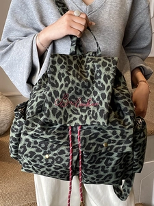 Fashionable leopard print canvas backpack with drawstring closure and large capacity