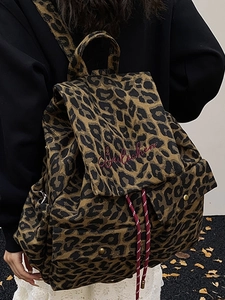 Vintage leopard print canvas backpack with red embroidery on high-quality fabric
