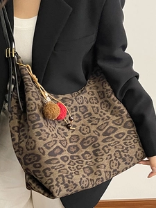 Vintage leopard print canvas tote bag with pompom charm for women's casual shoulder wear