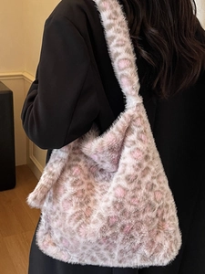 Plush leopard print tote bag with soft faux fur and wide shoulder strap for autumn fashion