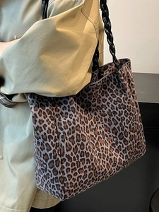 Large leopard print tote bag with black braided rope straps for casual autumn fashion