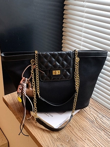 Chic black matte tote bag with diamond quilted flap, gold chain strap and heart charm