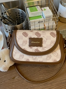 Vintage beige checkered crossbody bag with brown leather trim and cute cat print design