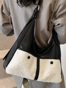 Minimalist hobo shoulder bag in black leather and white sherpa patchwork for women