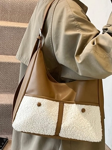 Retro contrast color tote bag in brown faux leather and white shearling for autumn