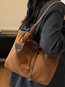 Brown vintage large capacity suede tote bag with knotted handle and tassel details