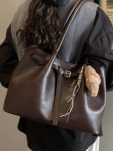 Vintage brown large capacity faux suede tote bag with teddy charm and drawstring detail
