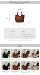 Tableau des tailles détaillé pour le grand sac fourre-tout en suède avec dimensions et coloris
