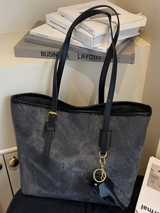 Large gray washed tote bag with black handles and elephant charm for daily office commute