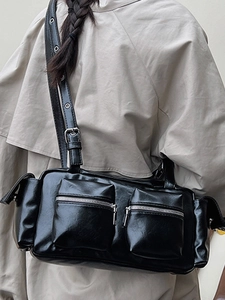 Chic black multi-pocket shoulder bag in shiny PU leather with silver hardware