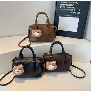 Detailed comparison of three vintage Boston style crossbody bags in black and brown PU leather