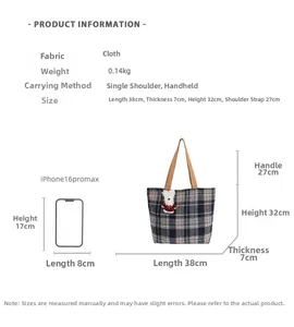 Size comparison of plaid tote bag with iPhone 16 Pro Max showing dimensions 38x32x7cm