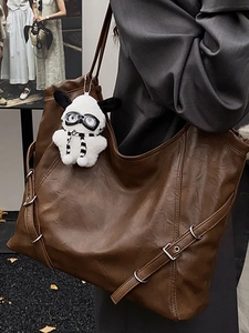 Retro large brown leather tote bag with a cute plush dog pendant charm for women
