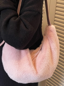 Pink plush crescent hobo bag for women with soft faux fur and wide shoulder strap