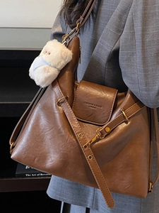 Retro large capacity dark brown tote bag with plush bear charm and adjustable strap