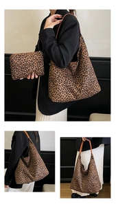 Detail showing high-capacity leopard print tote bag with brown faux leather shoulder straps