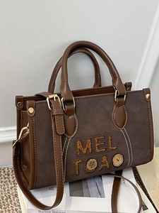 Grand sac cabas vintage en daim marron café avec finitions en cuir et boucles dorées