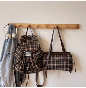 British style check backpack and tote bag set with cute bear embroidery on beige wall