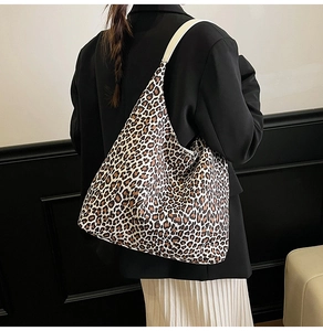 Fashionable leopard print tote bag shown on model with chic casual minimalist aesthetic