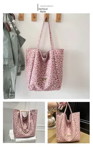Sac fourre-tout vertical à imprimé léopard rose avec plaque en métal doré pour le quotidien