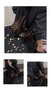 Detail of dark brown leather tote bag featuring leopard print fabric and golden B pendant