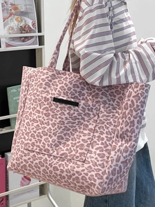 Grand sac cabas en toile à imprimé léopard rose avec poche frontale et style moderne