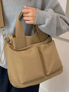 Japanese minimalist khaki nylon tote bag with large capacity and adjustable crossbody strap