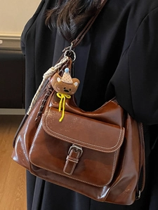 Retro dark brown leather hobo bag with moon shape and cute teddy bear charm