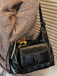 Retro black PU leather shoulder bag with white contrast stitching and plush bear charms