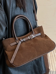 Brown suede baguette shoulder bag with leather strap and metal buckle for women