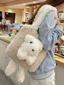 Plush lamb wool tote bag with cute 3D sheep design for women on soft indoor background