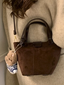 Vintage brown frosted suede bucket bag with leather handles and cute bear charm pendant