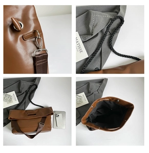 Detail view of brown PU tote bag showing silver hardware, rope strap and interior space