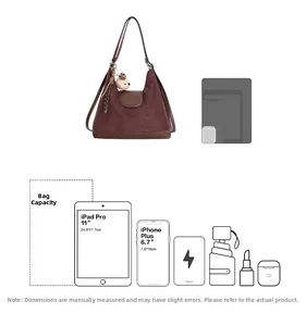 Brown vintage tote bag capacity detail showing it fits an 11-inch iPad Pro and essentials