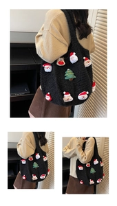 Detail view of large black fleece tote bag with 3D plush Christmas Santa and reindeer motifs