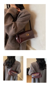 Détail du sac bandoulière en cuir bordeaux avec fermoir doré et finition lisse élégante