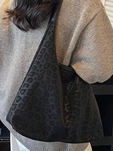 Minimalist black leopard print hobo bag for women with large capacity shoulder tote design