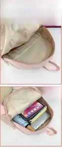 Internal view of pink shark backpack showing spacious main compartment and laptop sleeve