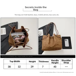 Detailed size guide and internal compartment view of the large brown suede tote bag