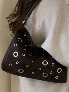 Vintage dark brown suede hobo bag with stylish silver metal eyelets and adjustable strap