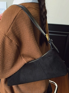 French style black suede baguette bag with gold buckle on shoulder strap for women