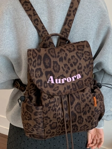 Retro leopard print canvas backpack for women featuring pink Aurora text and drawstring closure