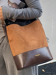 Vintage large capacity brown suede bucket bag with stylish leather patchwork and shoulder strap