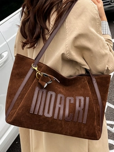 Large brown suede tote bag with MOACRI logo and slim leather straps for women
