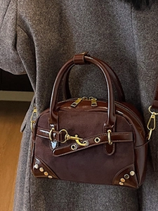 Vintage dark brown suede and patent leather handbag with gold buckles and rivets