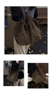 Three-view montage of a large leopard print tote bag with brown leather straps in autumn style