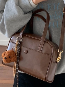 Vintage brown PU leather pillow handbag with plush dog pendant and detachable shoulder strap